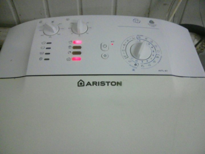 Аристон вертикальная. Аристон AVTL 104. Hotpoint Ariston AVTL 83 панель управления.