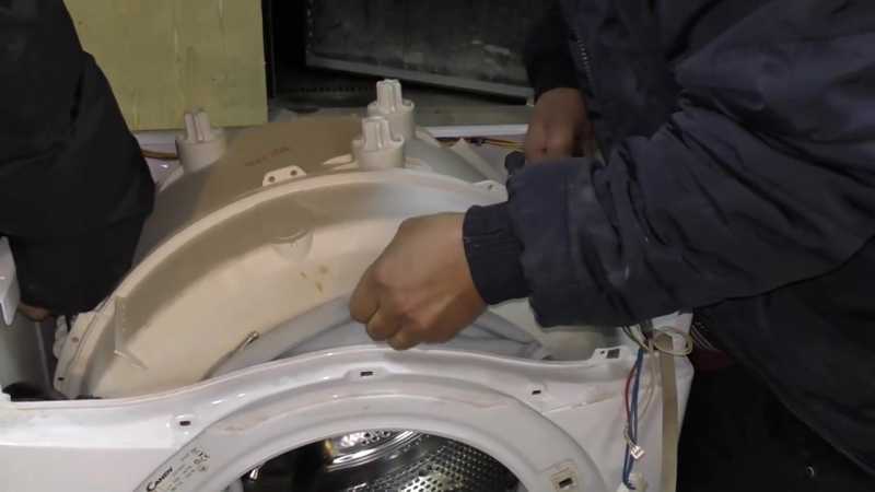 Замена барабана стиральной машины канди