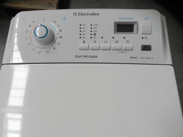 Вертикальная электролюкс. Вертикальная стиральная машина Electrolux 1000 RPM. Electrolux 6kg 1000rpm вертикальная. Стиральная машина Electrolux 6kg 1000rpm time Manager. Electrolux 6 kg 1000 RPM вертикальная загрузка.