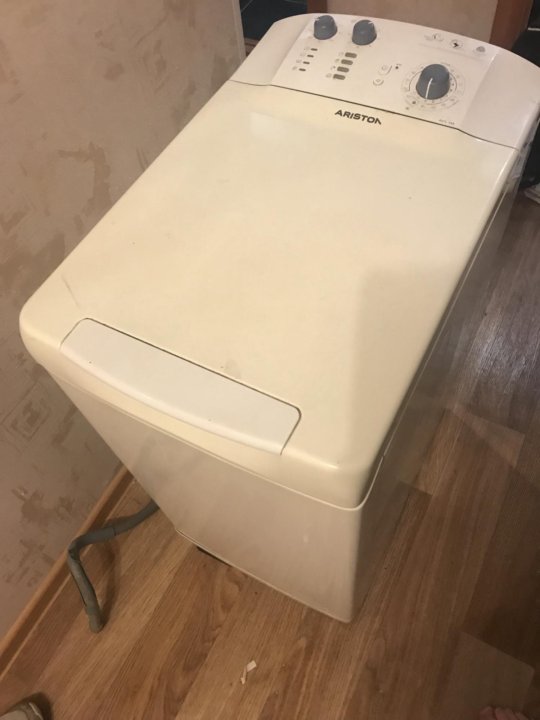 Аристон вертикальная загрузка. Hotpoint Ariston AVTL 109. AVTL 109 стиральная машина. Стиральная машина Avel 109. Стиральная машинка Ariston AVTL 20.